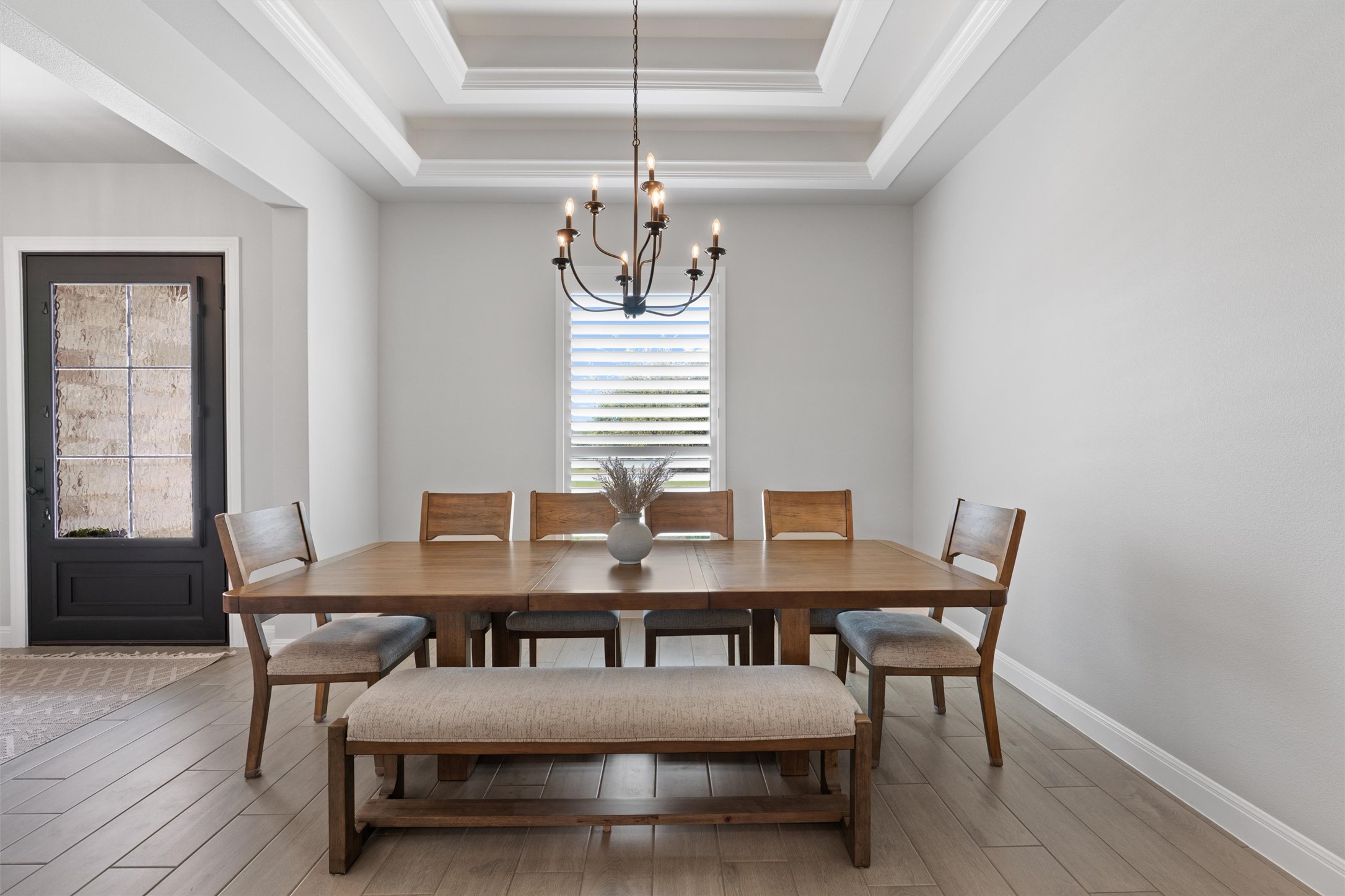210 Miranda Way Georgetown, TX 78633 - Photo 5 of 40 To your left, a formal dining room is crowned by a stunning tray ceiling.