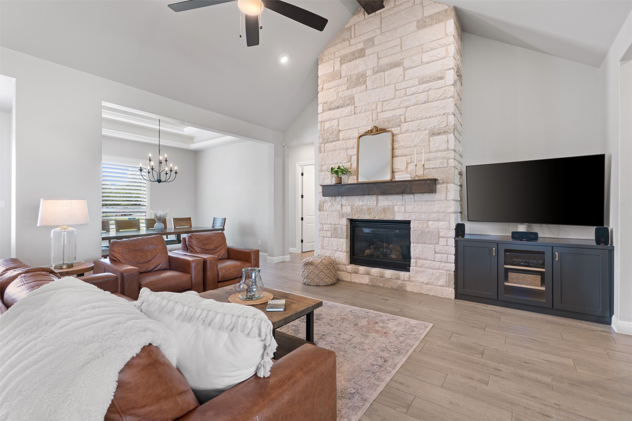 210 Miranda Way Georgetown, TX 78633 - Photo 8 of 40 The layout offers a continuous flow through the main spaces.
