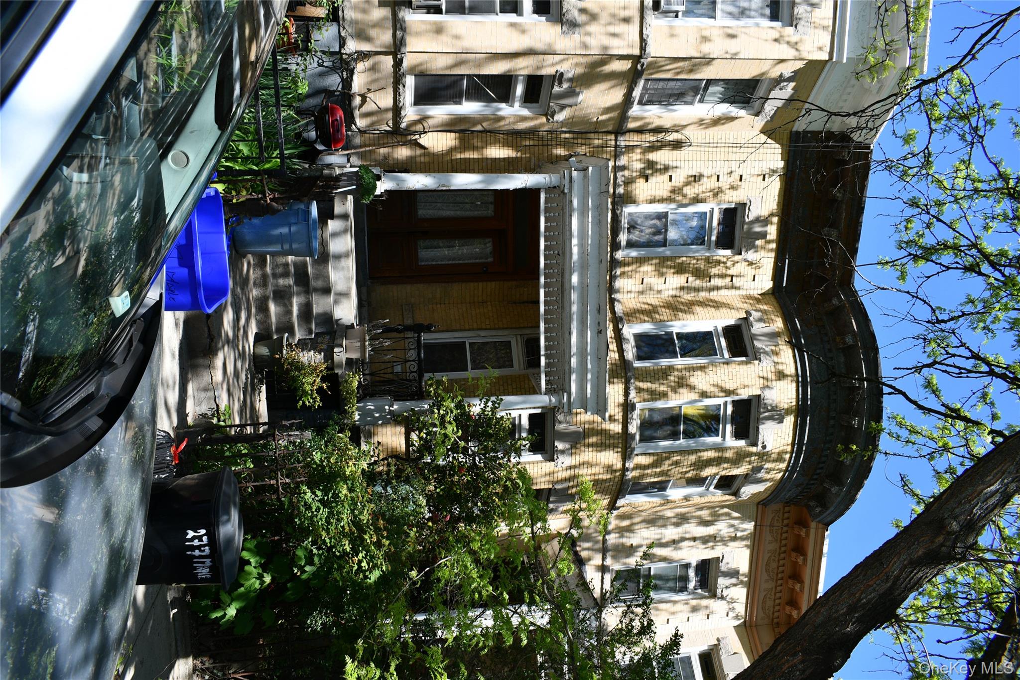 277 Maple Street Brooklyn, NY 11225 - Photo 3 of 5 a view of yard with a car park