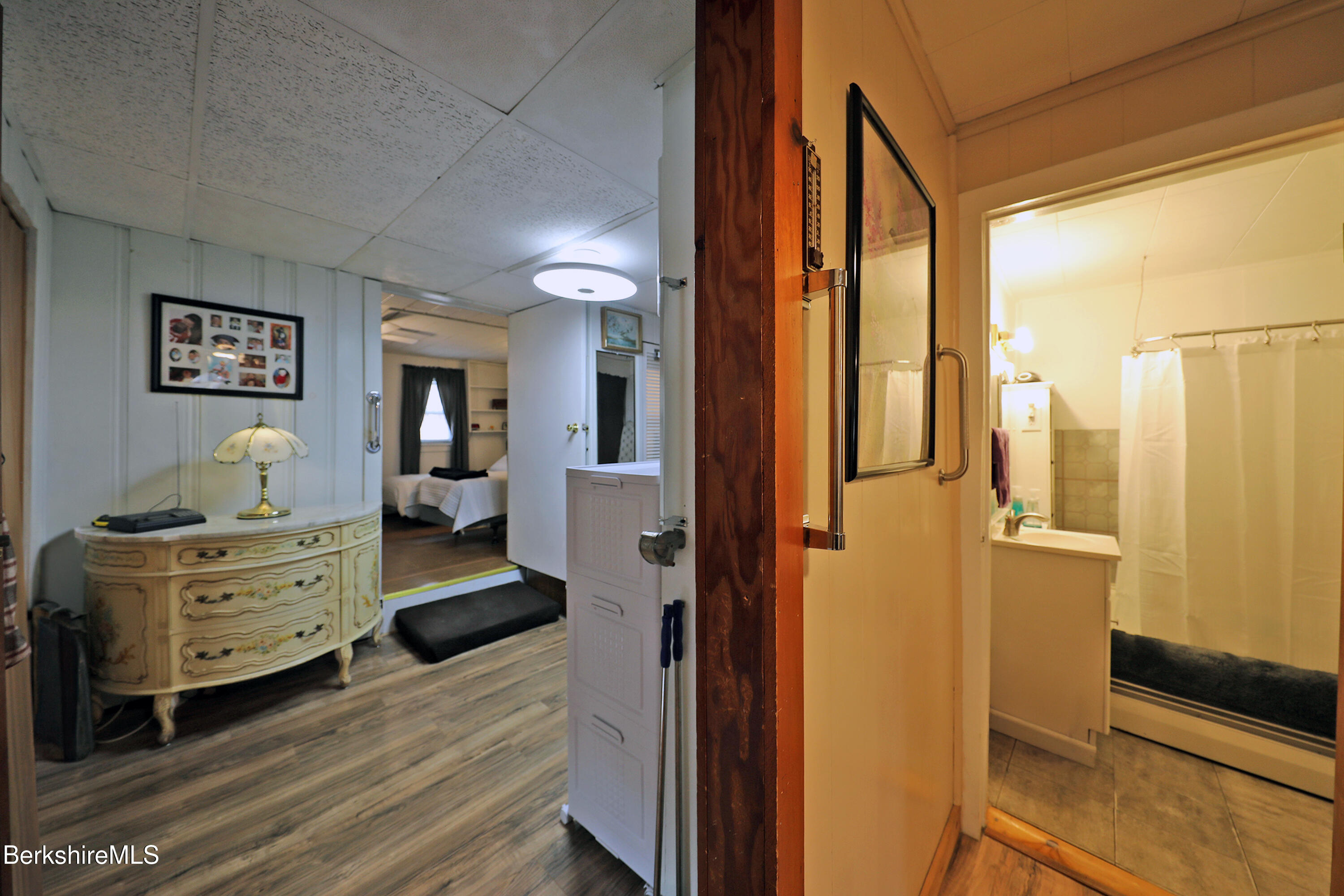 735 Cape Street Lee, MA 01238 - Photo 14 of 23 a room with furniture and a window