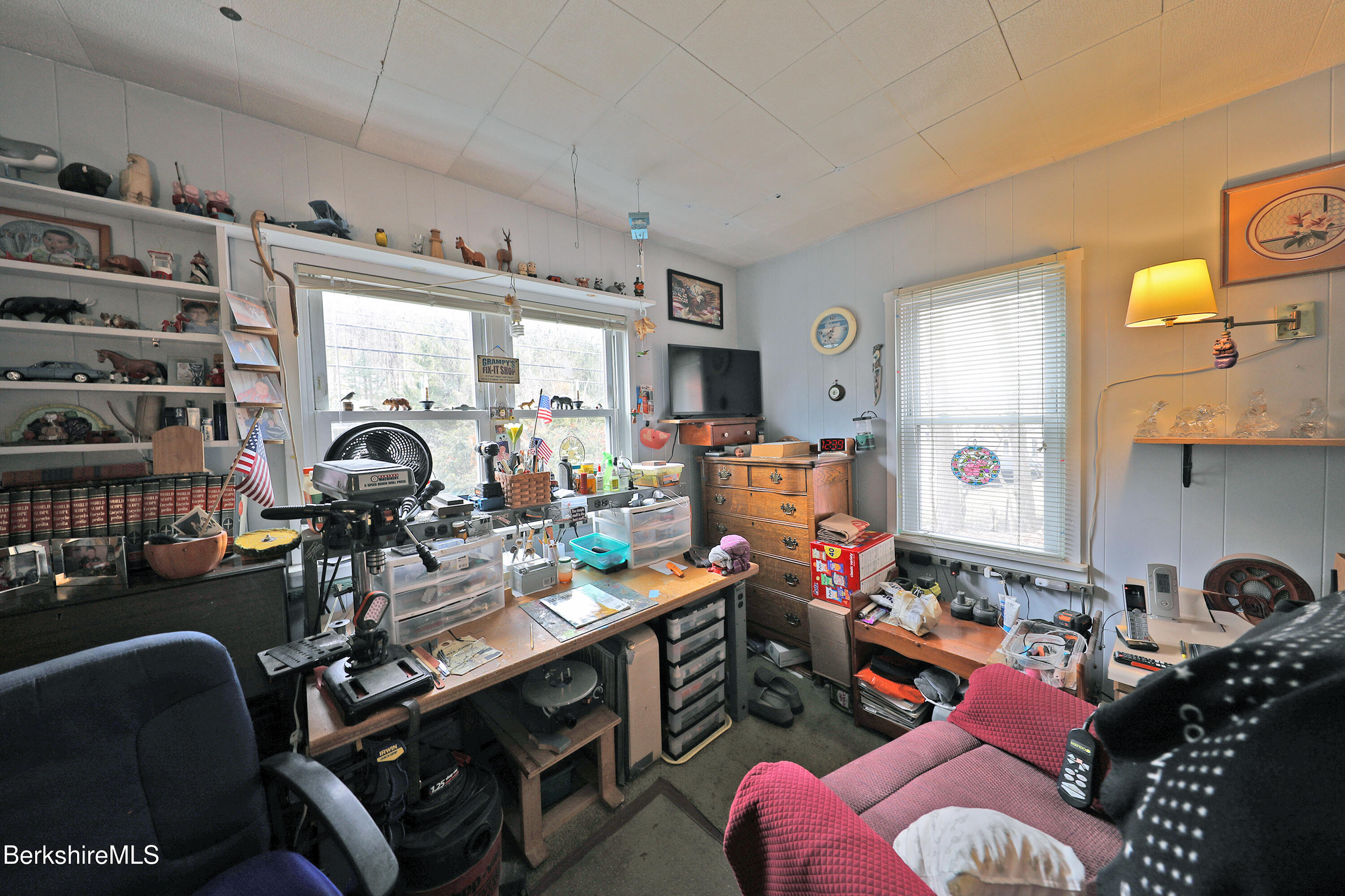 735 Cape Street Lee, MA 01238 - Photo 20 of 23 a view of a livingroom with workspace and a window