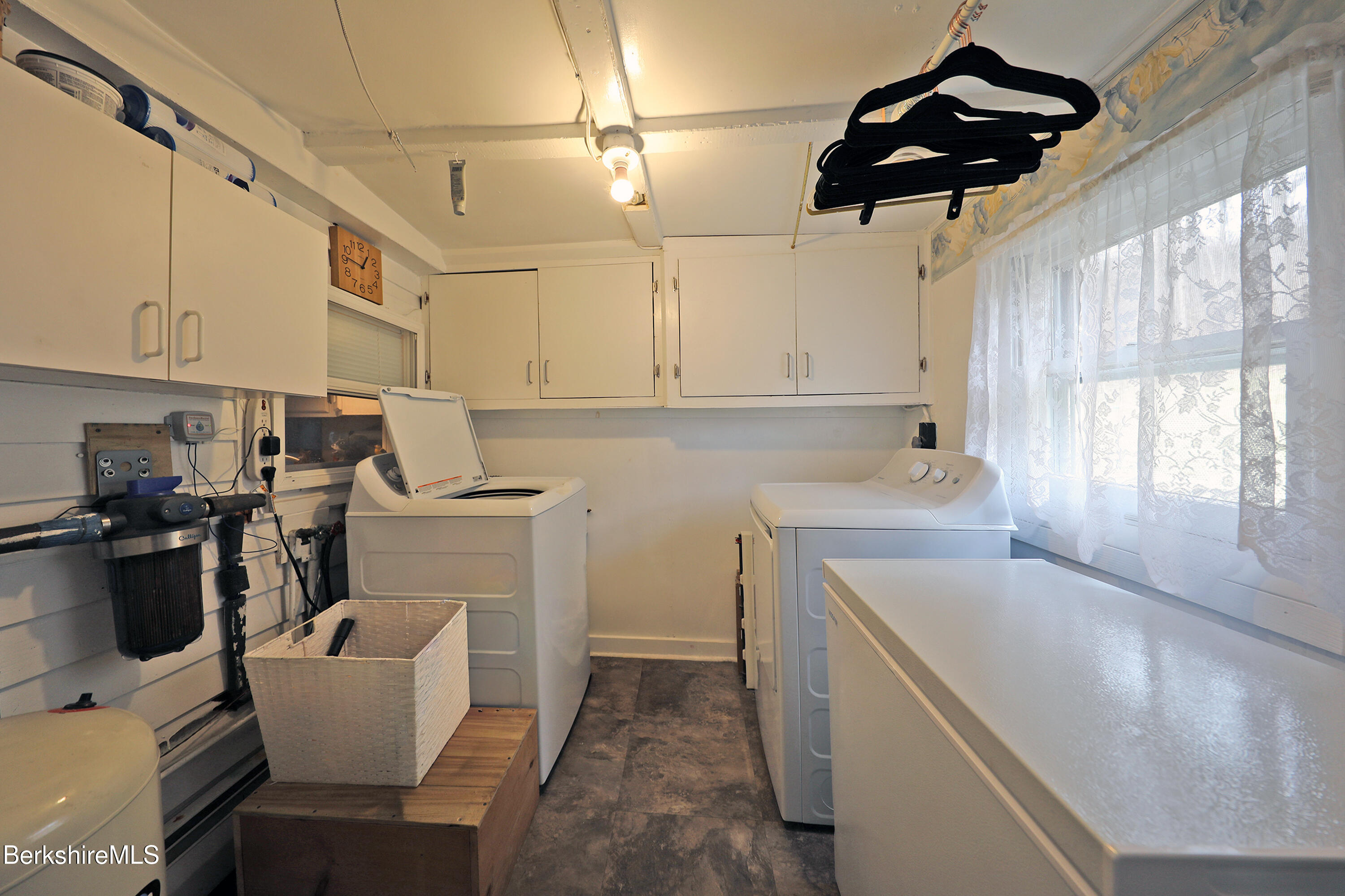 735 Cape Street Lee, MA 01238 - Photo 23 of 23 a kitchen with a sink cabinets and window