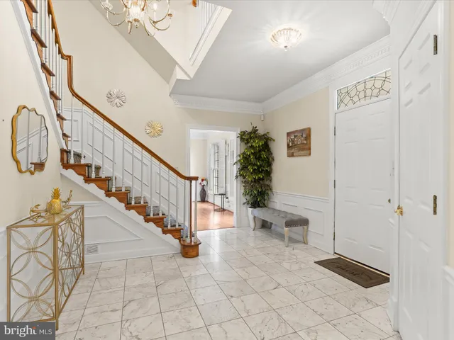 a kitchen with granite countertop a sink stove and cabinets