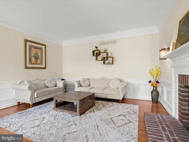 a view of a lake with houses in the background