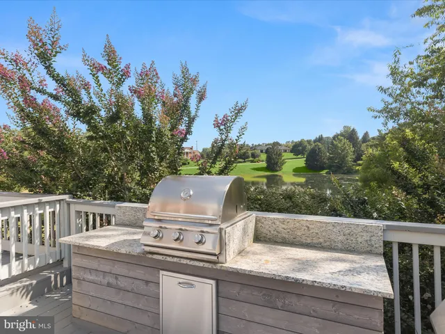 a spacious bedroom with a bed and a window