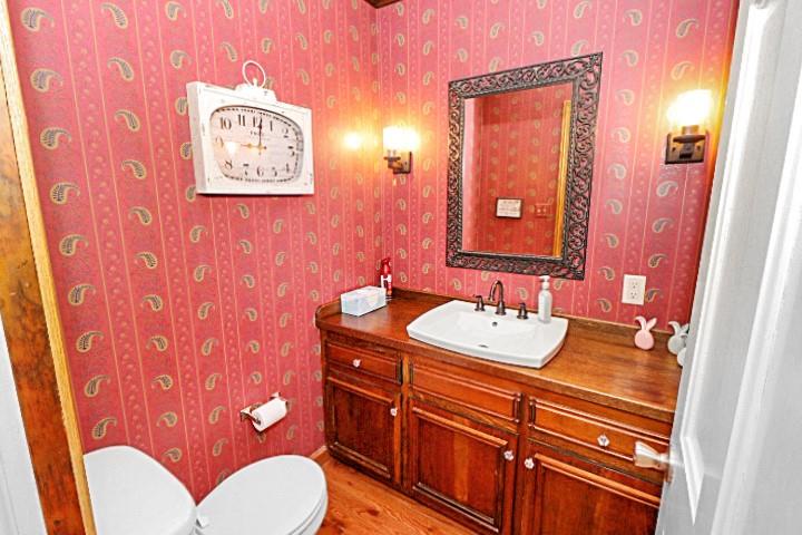 2776 Valleyview Drive Lower Burrell, PA 15068 - Photo 17 of 50 a bathroom with a sink mirror vanity and toilet