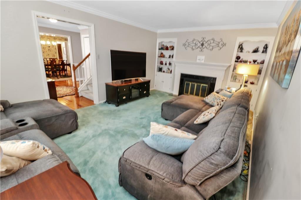 2776 Valleyview Drive Lower Burrell, PA 15068 - Photo 20 of 50 a living room with furniture and a flat screen tv
