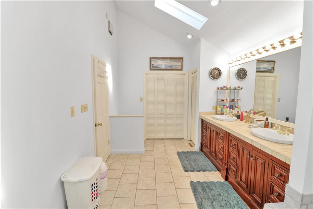 2776 Valleyview Drive Lower Burrell, PA 15068 - Photo 32 of 47 double bowl sinks, 2 skylights... laundry behind the doors