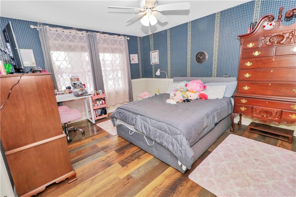 2776 Valleyview Drive Lower Burrell, PA 15068 - Photo 34 of 47 2nd Bedroom with new laminate flooring, ceiling fan, and private full bath