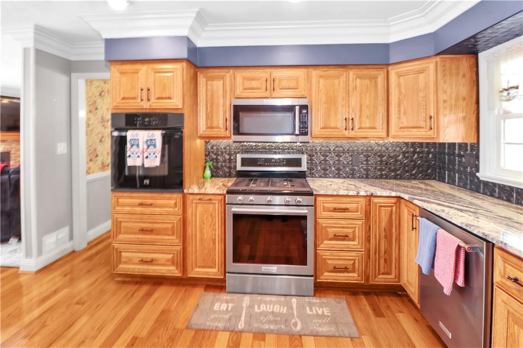 2776 Valleyview Drive Lower Burrell, PA 15068 - Photo 4 of 47 4 lazy Susans, deep sink, gleaming hardwood flooring...