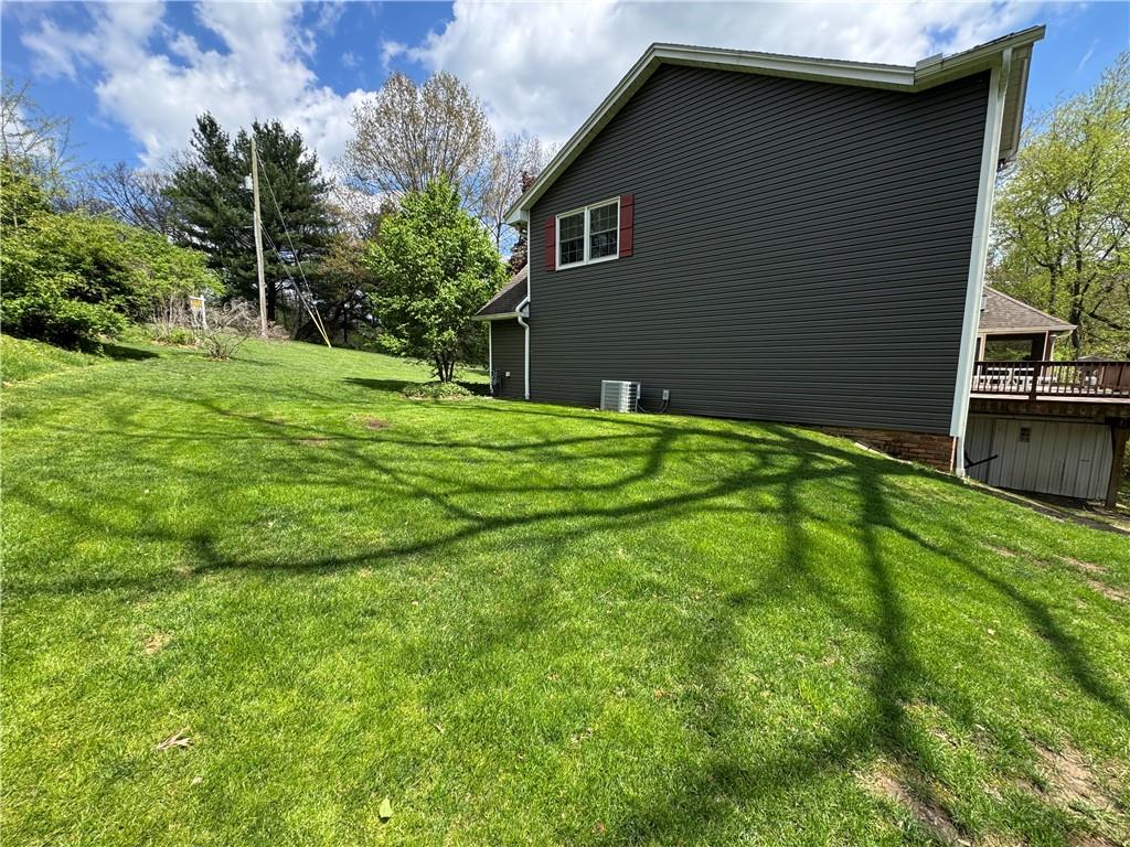 2776 Valleyview Drive Lower Burrell, PA 15068 - Photo 50 of 50 a backyard of a house with lots of green space