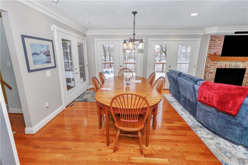 2776 Valleyview Drive Lower Burrell, PA 15068 - Photo 6 of 47 Casual dining area n great room with wall of windows and French doors to screened in porch