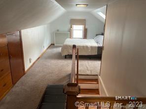 121 Clark Street Milford, CT 06460 - Photo 23 of 35 a bedroom with a bed and a window