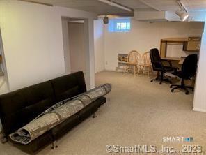 121 Clark Street Milford, CT 06460 - Photo 31 of 35 a living room with furniture and a window