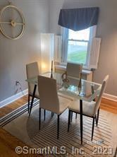 121 Clark Street Milford, CT 06460 - Photo 9 of 35 a view of a dining room with furniture window and outside view