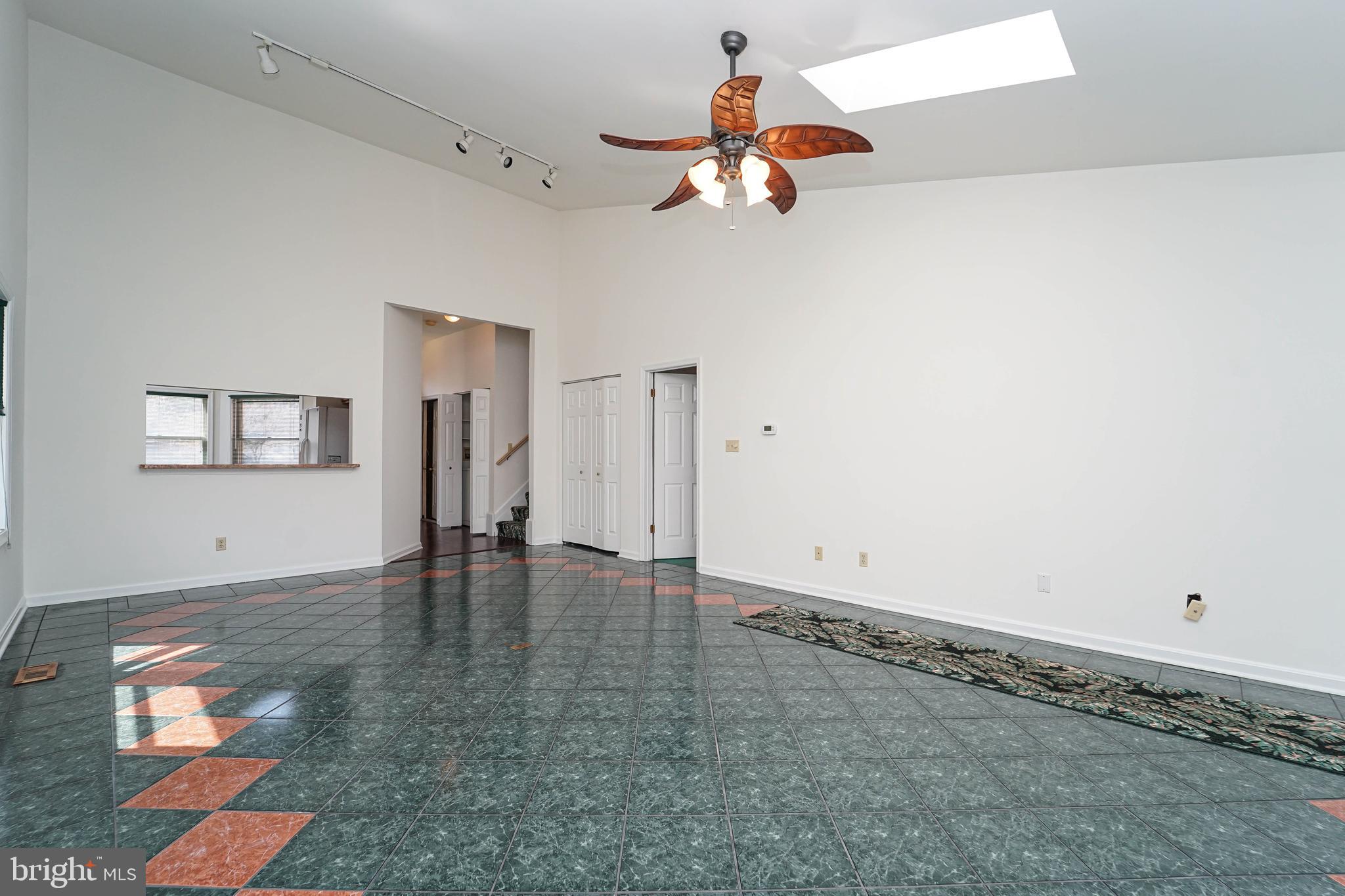 7009 Bridgepointe Drive Chester, MD 21619 - Photo 25 of 41 wooden floor in an empty room