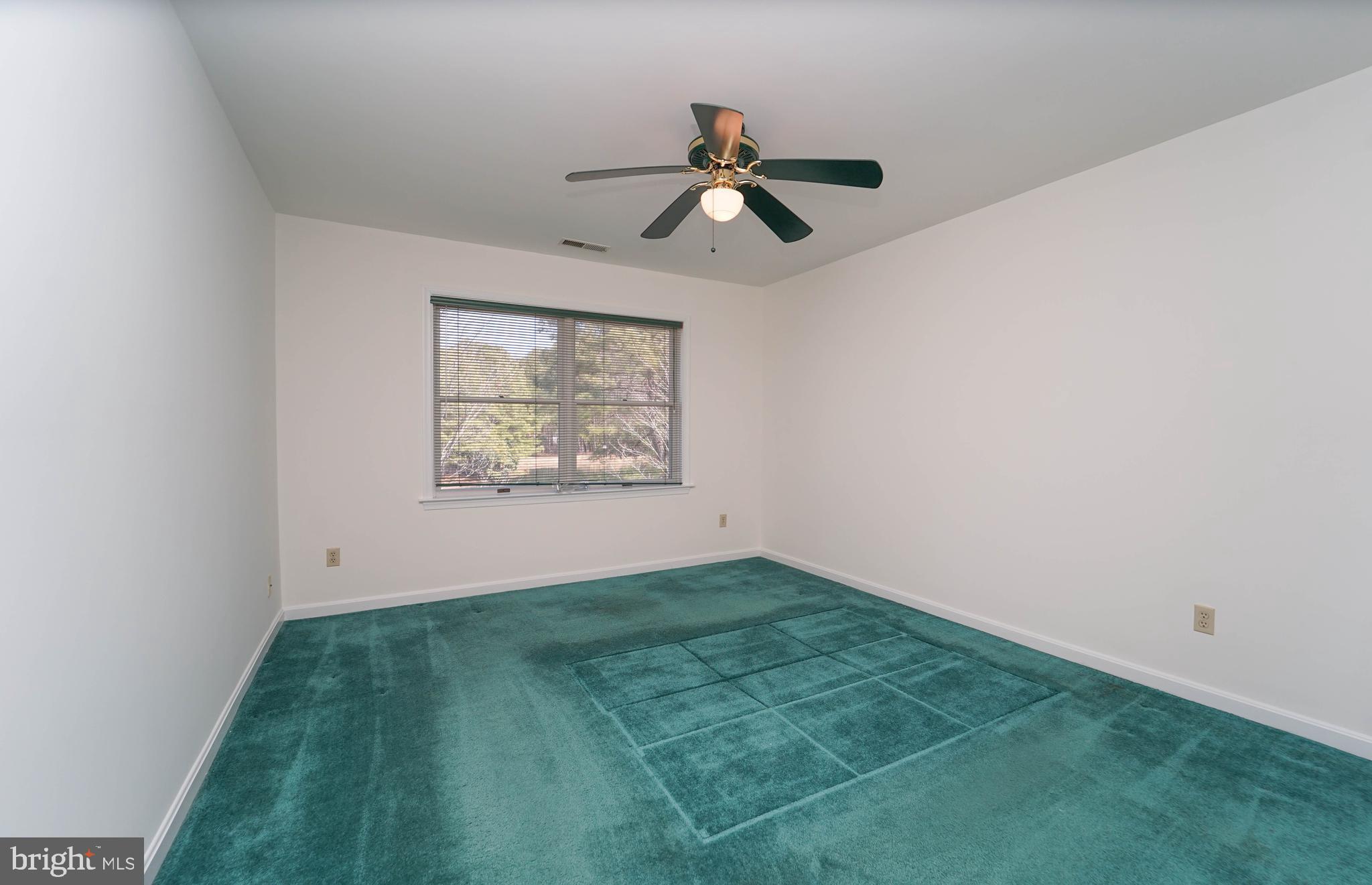 7009 Bridgepointe Drive Chester, MD 21619 - Photo 40 of 41 a view of empty room with ceiling fan