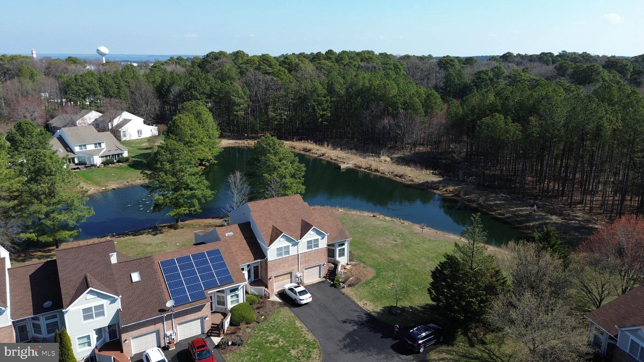 7009 Bridgepointe Drive Chester, MD 21619 - Photo 7 of 41 an aerial view of a house with garden space and lake view