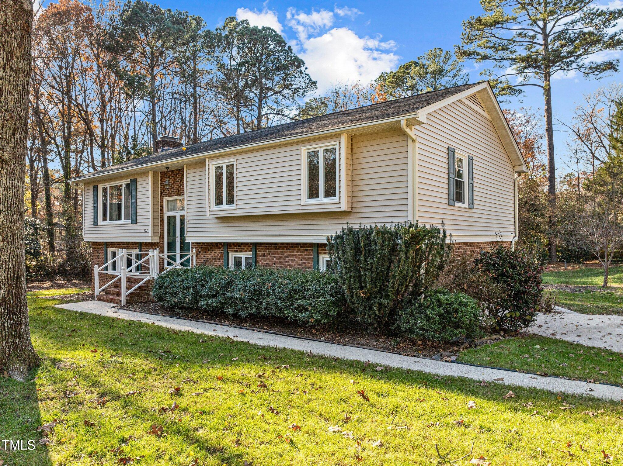 307 Rustic Ridge Road Cary, NC 27511 - Photo 2 of 47 16-web-or-mls-DJI_0631