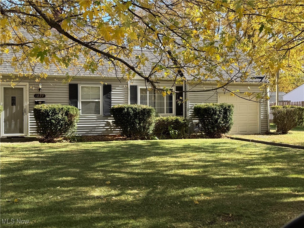 1877 Clyde Road Madison, OH 44057 - Photo 1 of 19 Rear view of property with a lawn