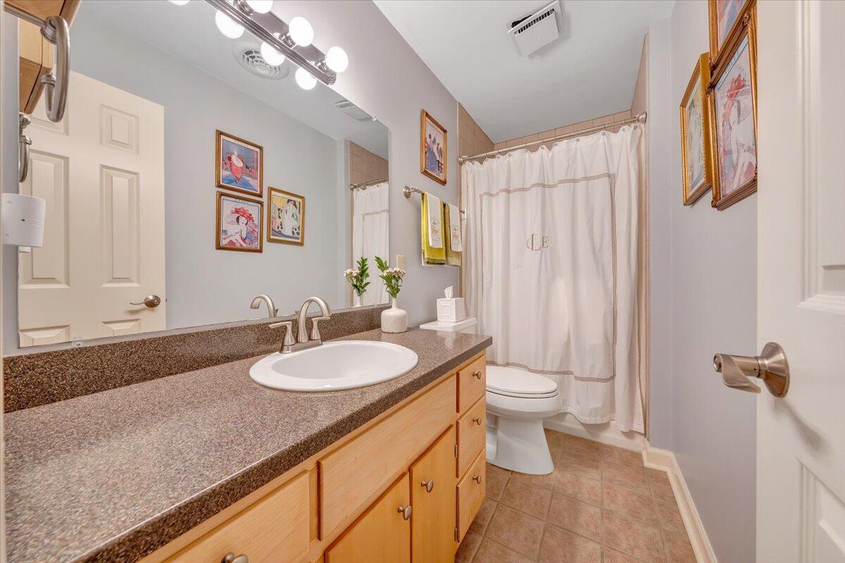 5249 Falcon Ridge Road Roanoke, VA 24018 - Photo 31 of 58 a bathroom with a granite countertop sink toilet and shower