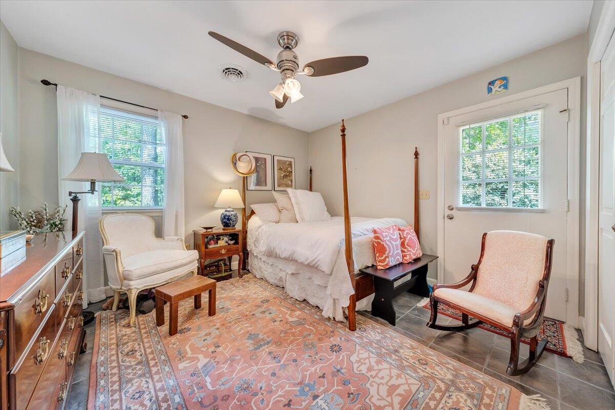 5249 Falcon Ridge Road Roanoke, VA 24018 - Photo 32 of 58 a bed room with a bed and a chair