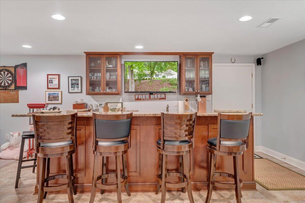 5249 Falcon Ridge Road Roanoke, VA 24018 - Photo 39 of 58 a view of a dining room with furniture and a large window