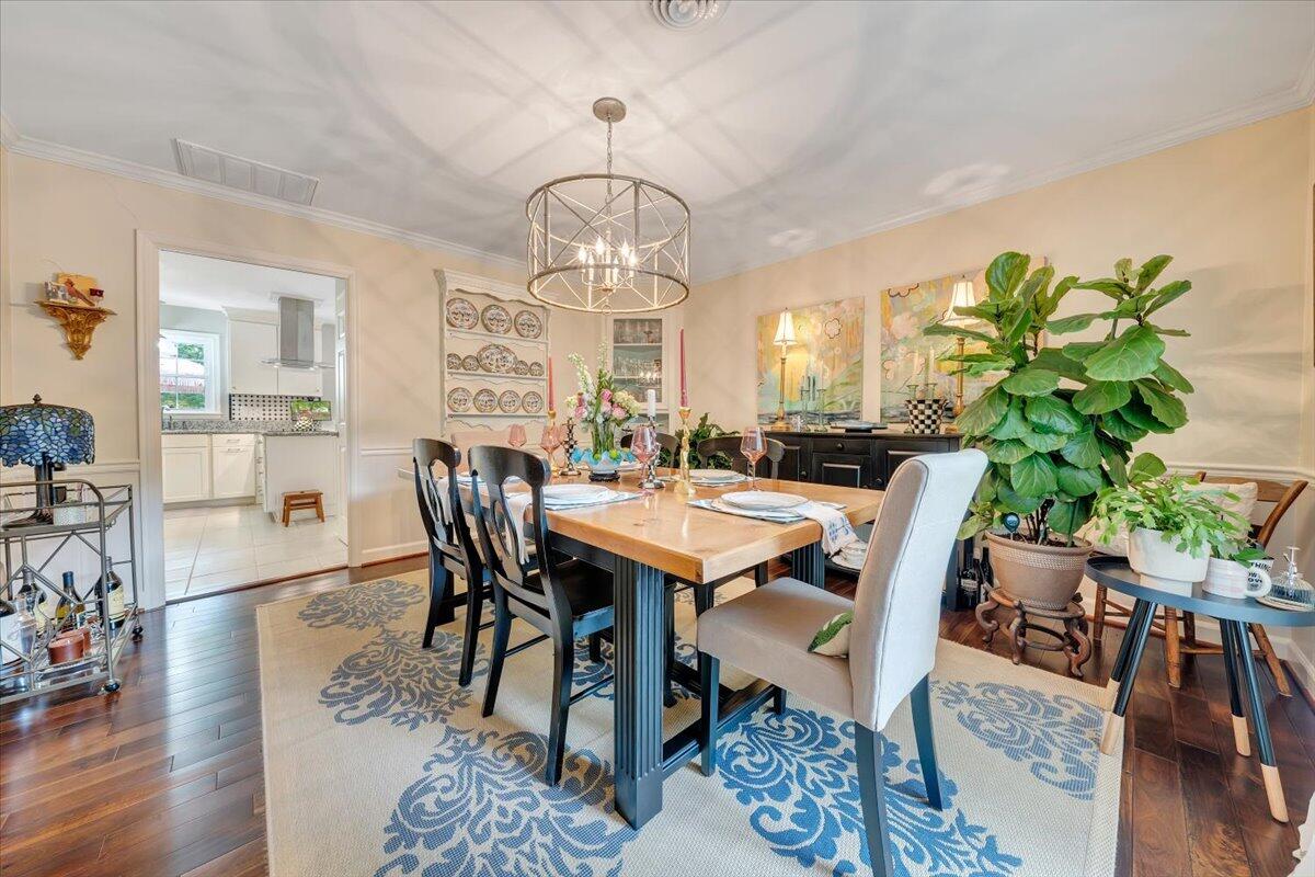 5249 Falcon Ridge Road Roanoke, VA 24018 - Photo 8 of 58 a view of a dining room with furniture wooden floor and chandelier