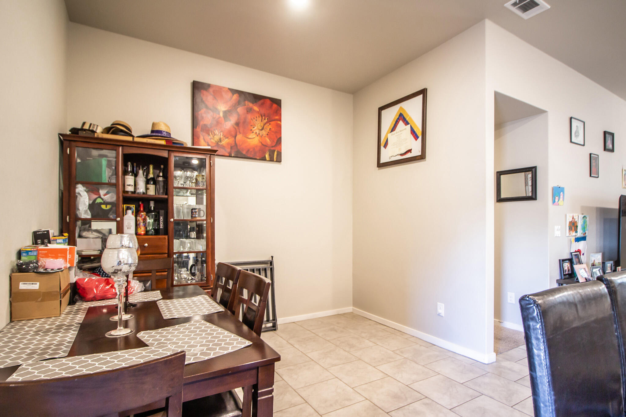 2908 Waverly Avenue Lubbock, TX 79407 - Photo 10 of 22 a living room with furniture and book shelf