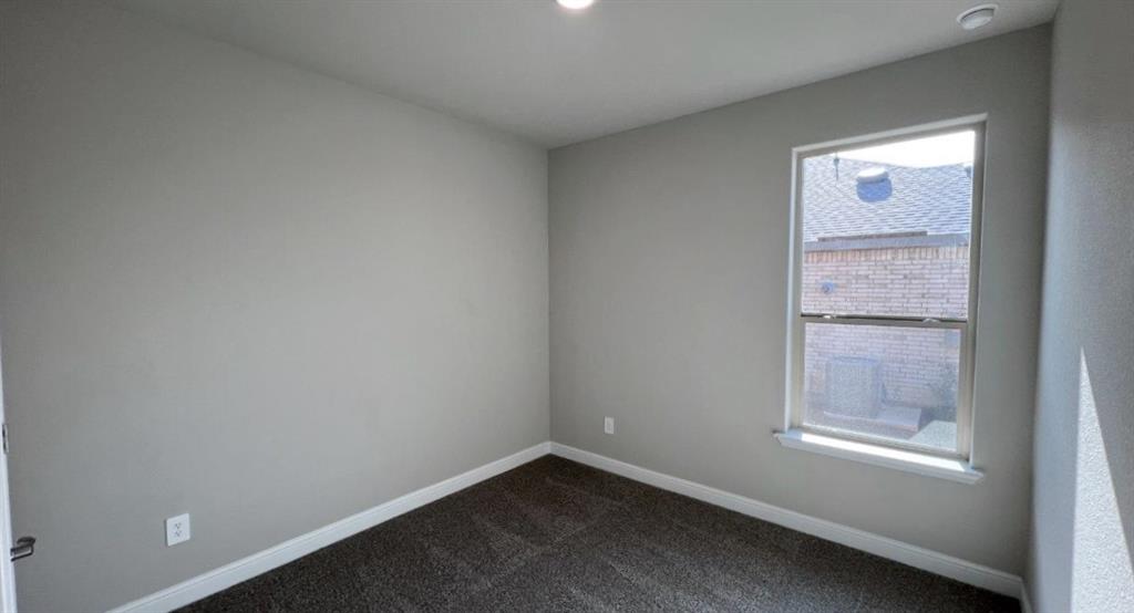 153 Medina Lane Rhome, TX 76078 - Photo 10 of 21 an empty room with a window