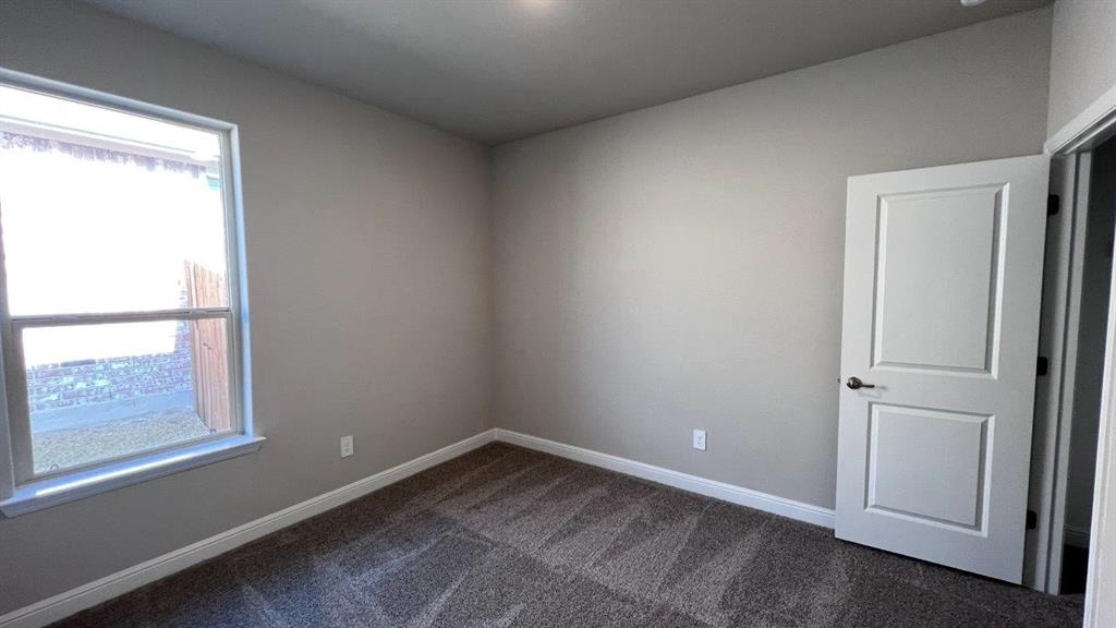 153 Medina Lane Rhome, TX 76078 - Photo 11 of 21 an empty room with a window