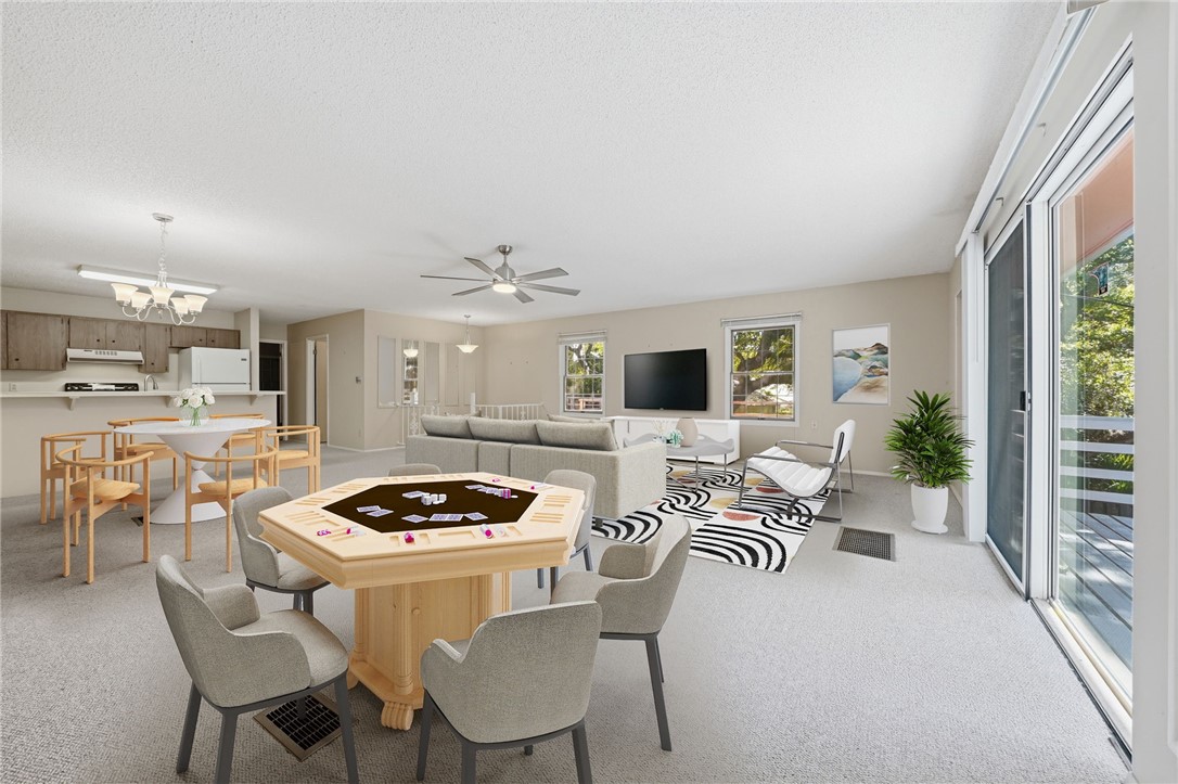 1951 West Shell Lane Vero Beach, FL 32963 - Photo 12 of 35 a kitchen with a table and chairs in it