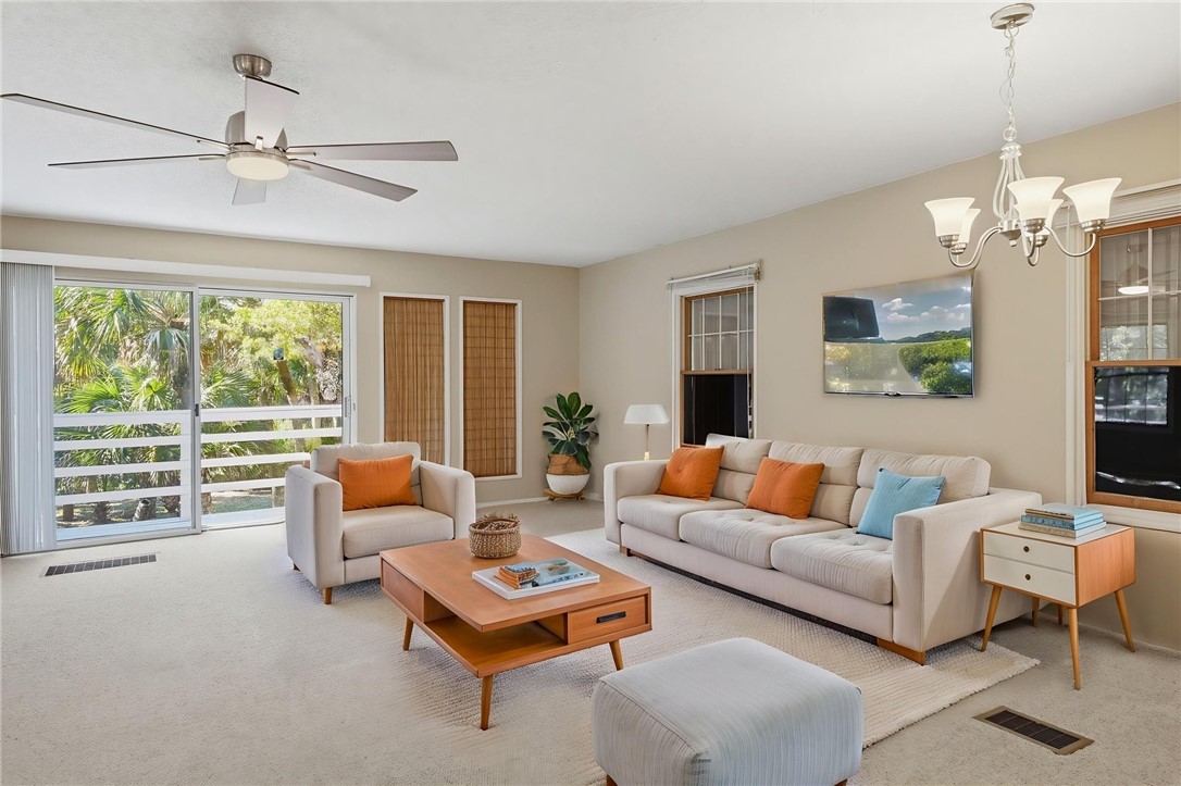1951 West Shell Lane Vero Beach, FL 32963 - Photo 14 of 35 a living room with furniture and a large window