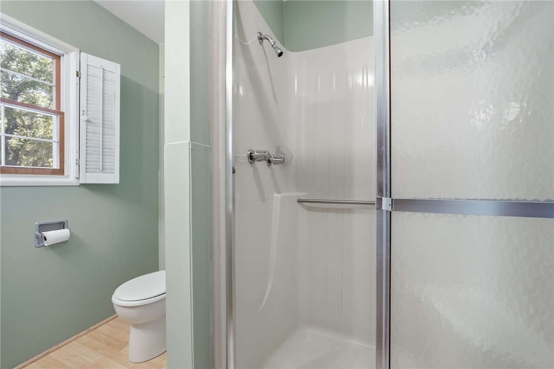 1951 West Shell Lane Vero Beach, FL 32963 - Photo 20 of 35 a bathroom with a toilet a sink and shower