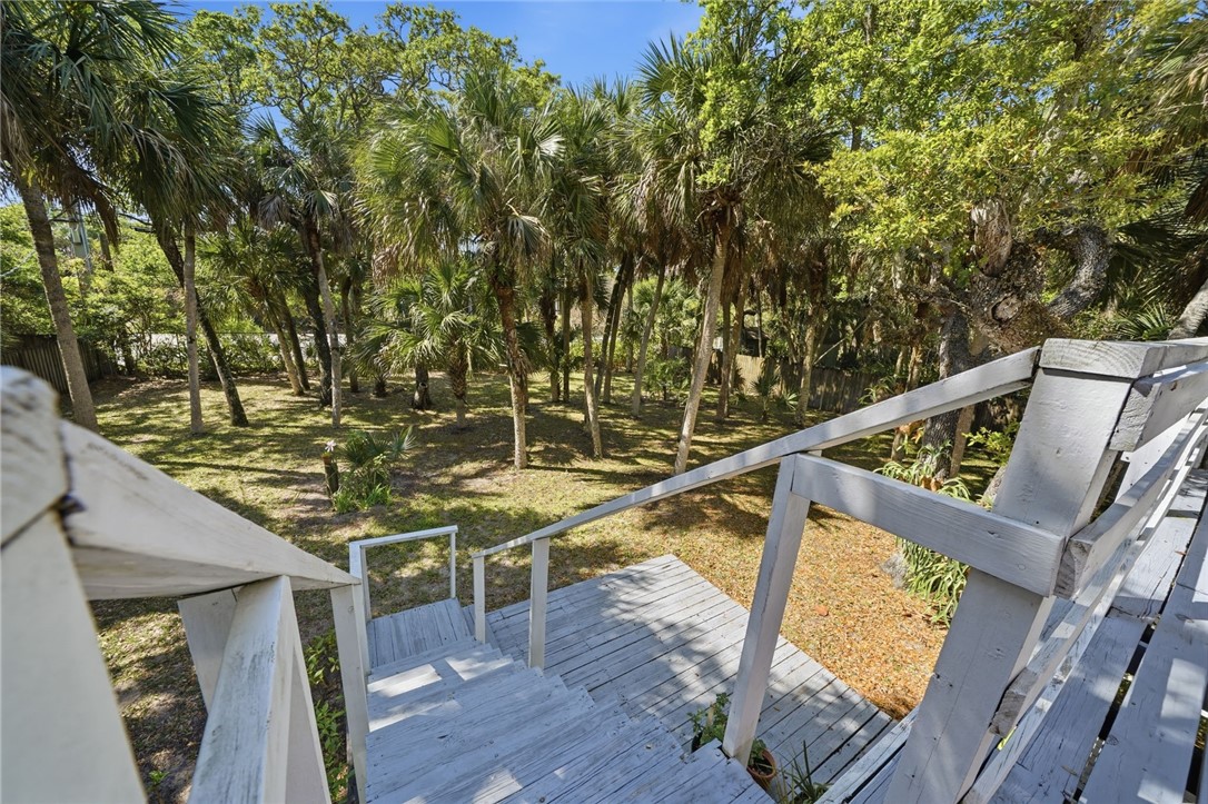 1951 West Shell Lane Vero Beach, FL 32963 - Photo 23 of 35 a view of balcony with wooden floor and fence