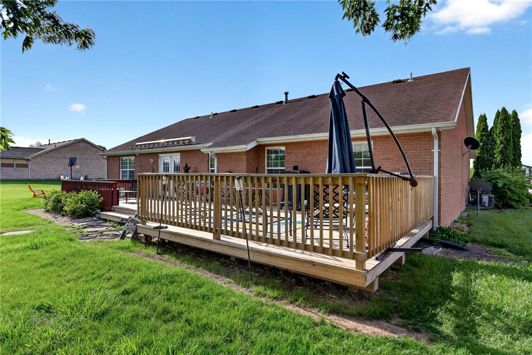 4996 Shannon Avenue Springfield, OH 45504 - Photo 59 of 61 This spacious backyard deck offers ample room for outdoor relaxation and entertaining.