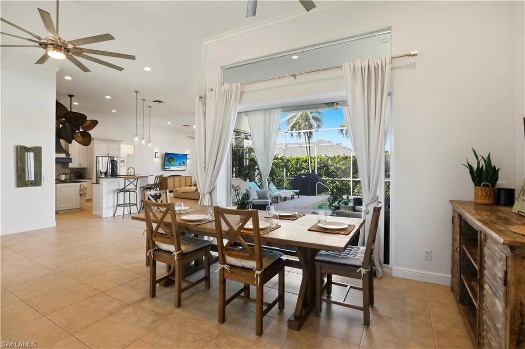 80 Delbrook Way Marco Island, FL 34145 - Photo 14 of 49 Dining space with ceiling fan, light tile patterned floors, and recessed lighting