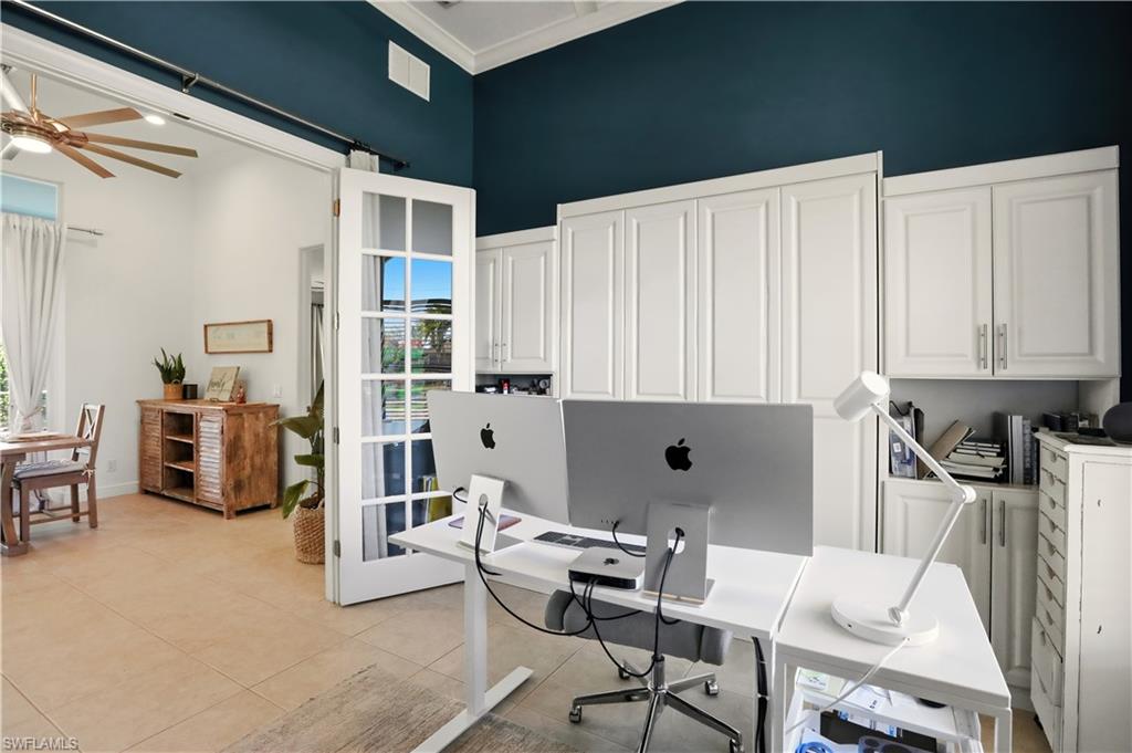 80 Delbrook Way Marco Island, FL 34145 - Photo 35 of 49 Office with a ceiling fan, a high ceiling, light tile patterned floors, and ornamental molding
