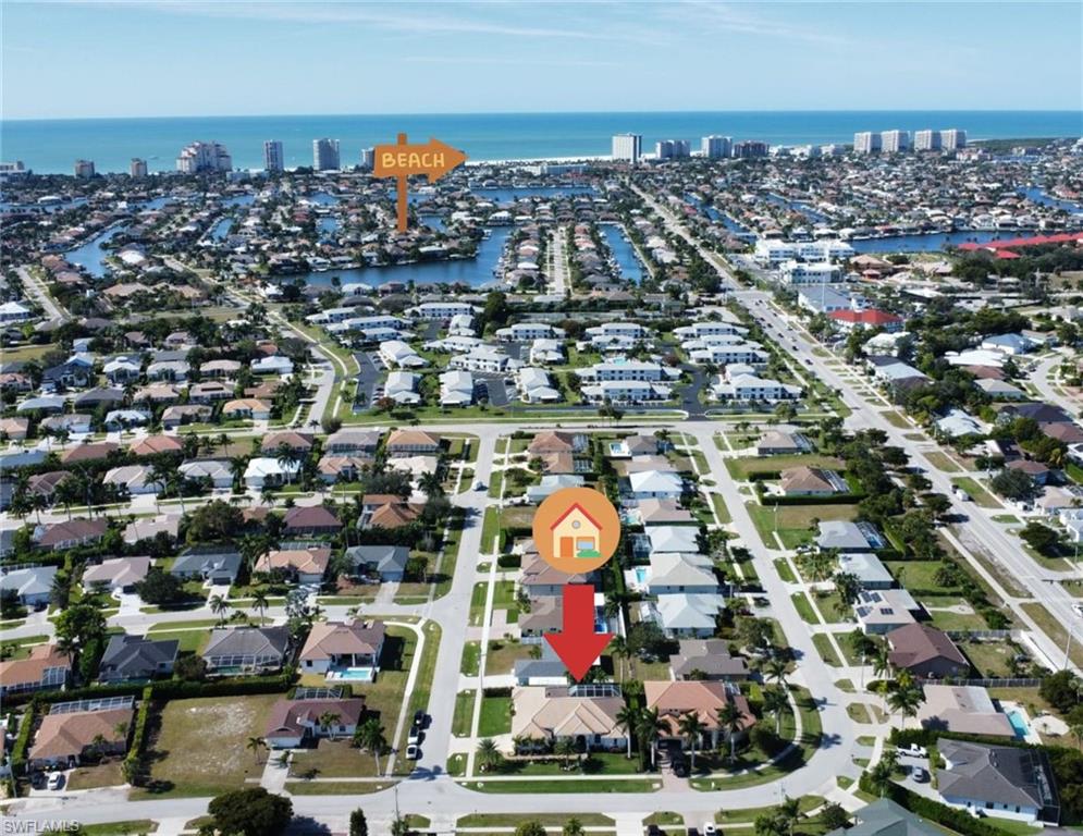 80 Delbrook Way Marco Island, FL 34145 - Photo 4 of 49 View of property location with a nearby body of water and nearby suburban area