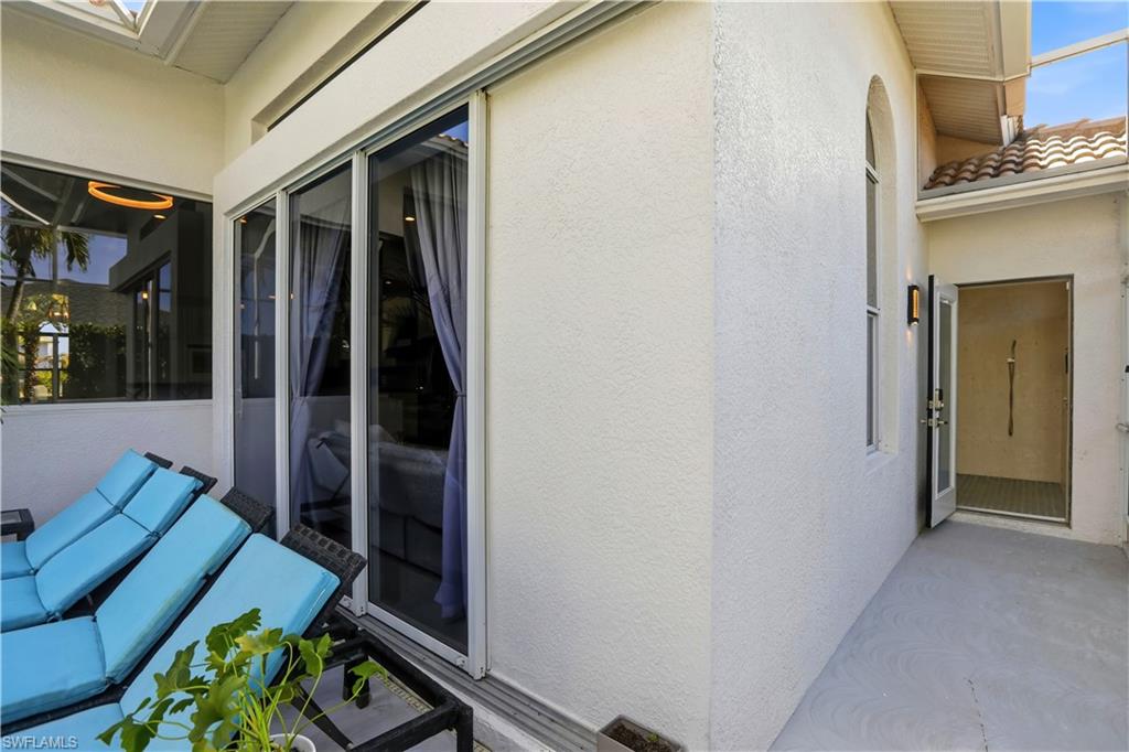 80 Delbrook Way Marco Island, FL 34145 - Photo 44 of 49 showing the 2nd bathroom access that has a Yale smart lock for easy access straight into the shower and bathroom area.