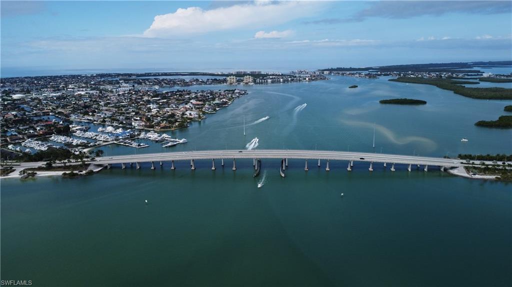 80 Delbrook Way Marco Island, FL 34145 - Photo 47 of 49 Bird's eye view of a notable bridge and a nearby body of water
