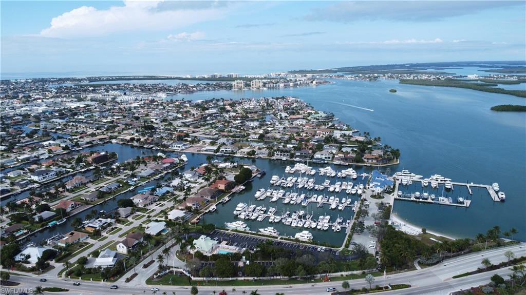 80 Delbrook Way Marco Island, FL 34145 - Photo 48 of 49 Aerial view of surrounding area featuring a nearby body of water