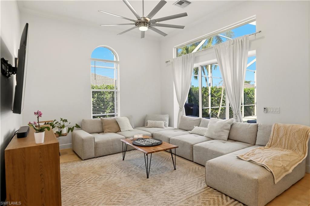 80 Delbrook Way Marco Island, FL 34145 - Photo 9 of 49 Living room with a ceiling fan