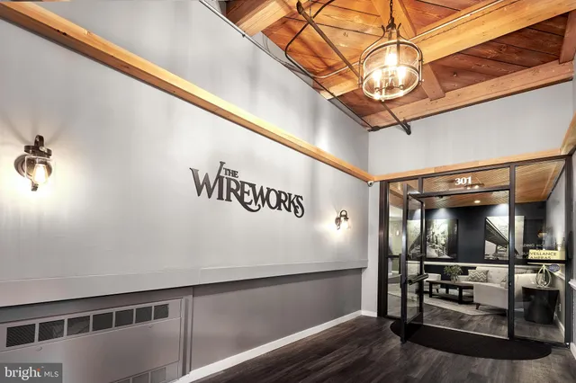 a view of a livingroom with furniture and a ceiling fan