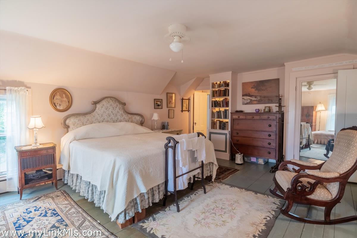 13 Cliff Road Nantucket, MA 02554 - Photo 31 of 38 a bedroom with a bed a couch and dresser