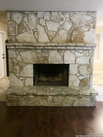 a living room with a fireplace