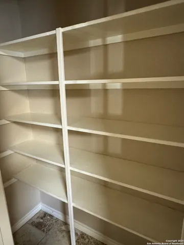 a view of a room with rack on the wall