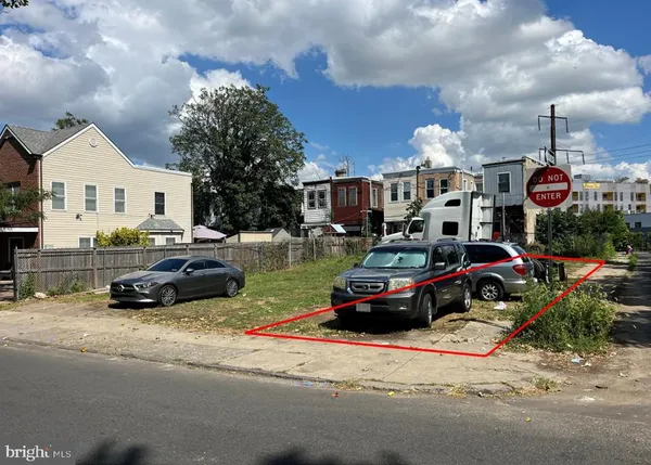 a car parked in front of a house