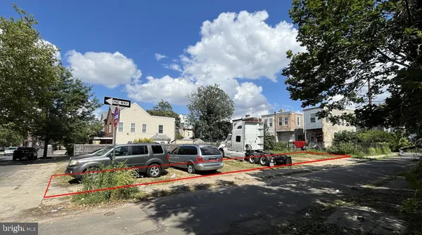 a cars parked in front of a building