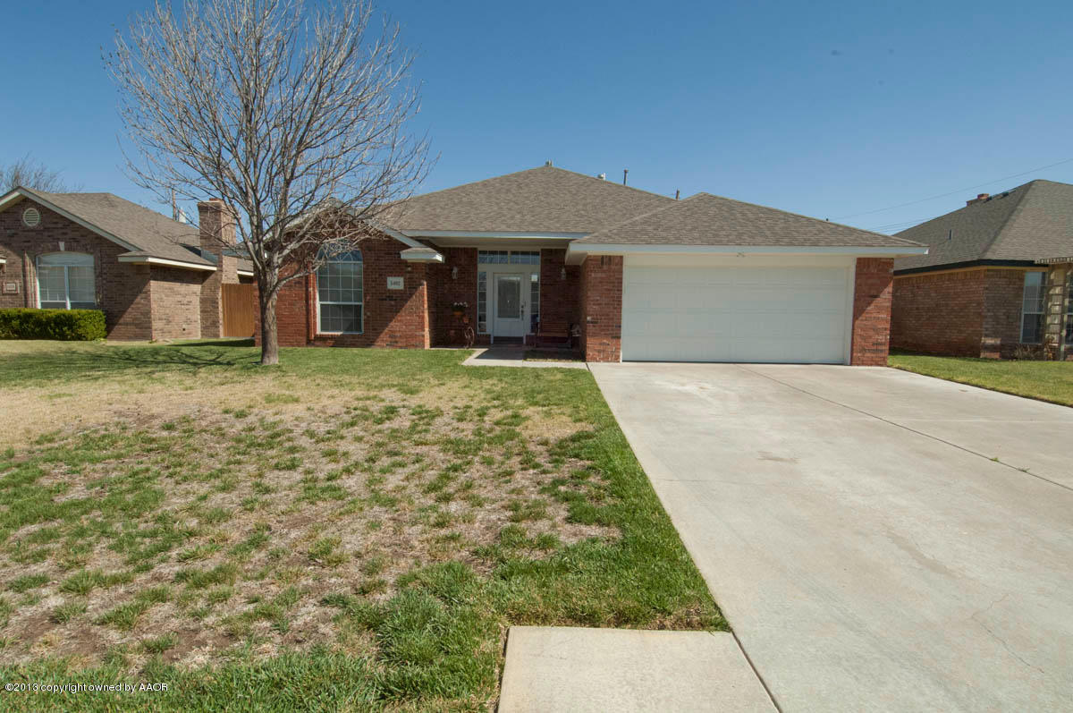 5402 Leo Lane Amarillo, TX 79110 - Photo 2 of 37 a front view of a house with a yard